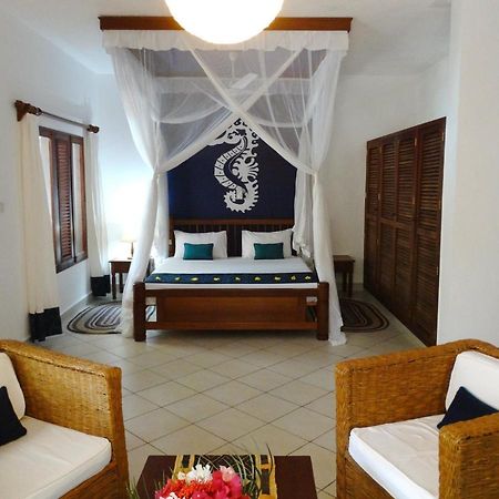 Diani Cottages เดียนีบีช ภายนอก รูปภาพ
