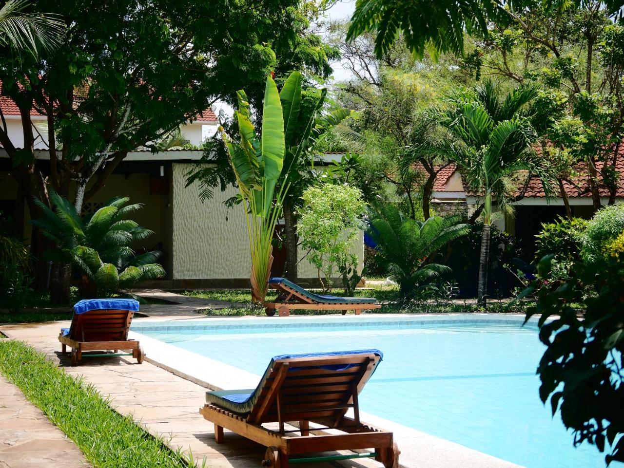 Diani Cottages เดียนีบีช ภายนอก รูปภาพ